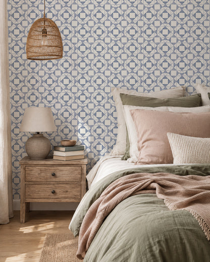 Classic Quilt Dusty Blue wallpaper in a cozy bedroom with wood furniture, cream bedding and soft blush accents.