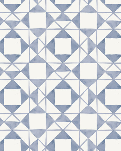 Classic Quilt Dusty Blue wallpaper with hand-drawn geometric patchwork shapes in soft blue and cream.