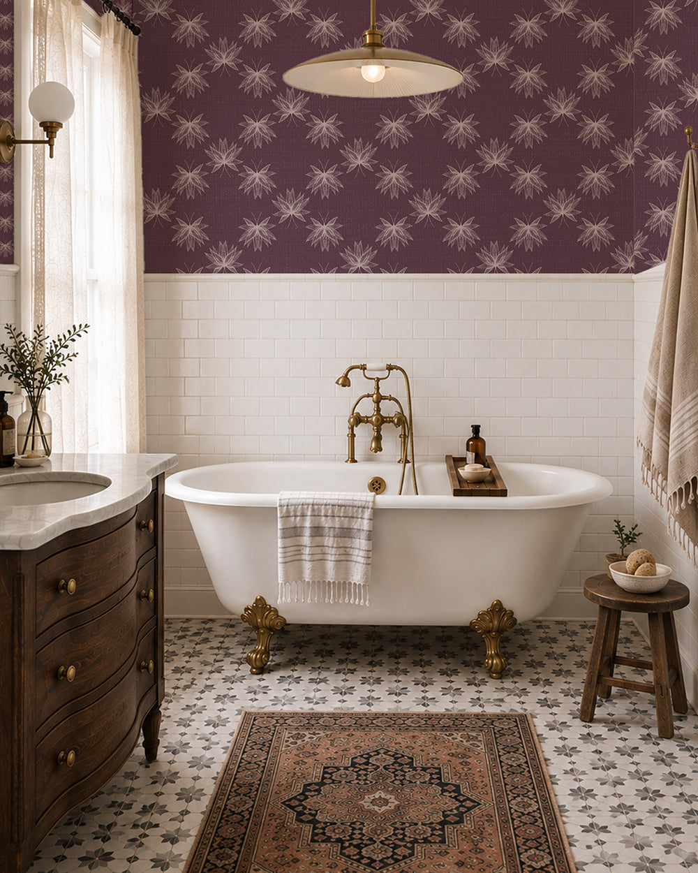 Flutter Plum wallpaper in a vintage bathroom with a clawfoot tub, dark wood vanity and brass accents.
