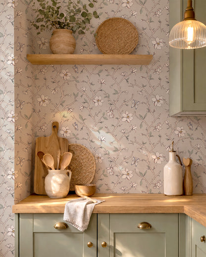 Magnolia Bloom Taupe wallpaper in a warm kitchen with wood counters, cream cabinetry and natural decor.
