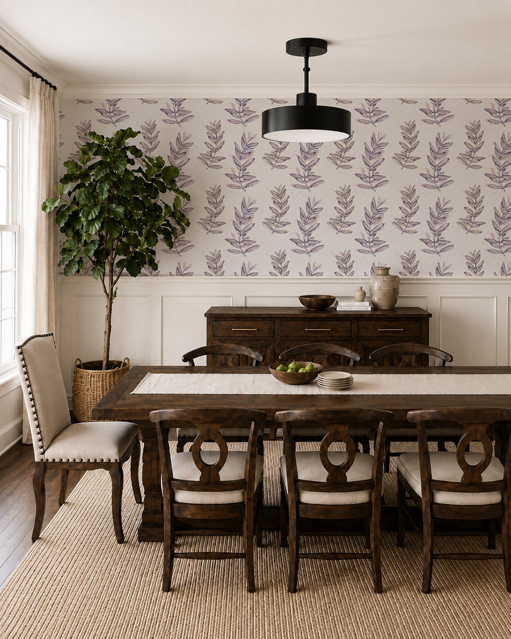 Olive Branch Plum wallpaper in a warm dining room with dark wood furniture, cream paneling and natural accents.